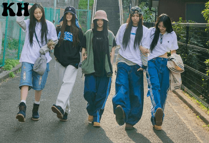 a group of women walking on a street