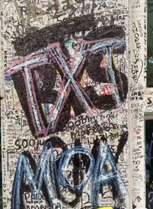 TXT Fans Accused Of Defacing BTS Mural At Big Hit’s Old Building
