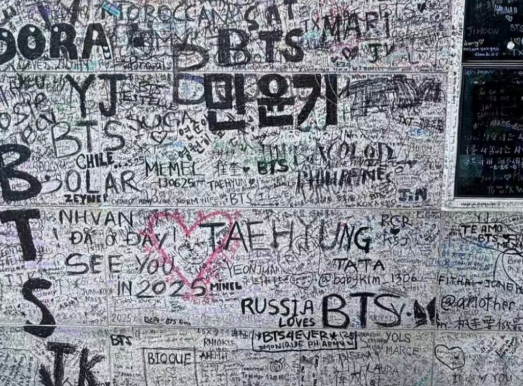 TXT Fans Accused Of Defacing BTS Mural At Big Hit’s Old Building