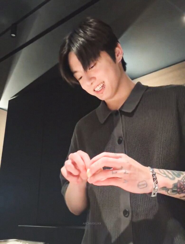 Jungkook's Bracelet Sparks Heated Discussions Among ARMY